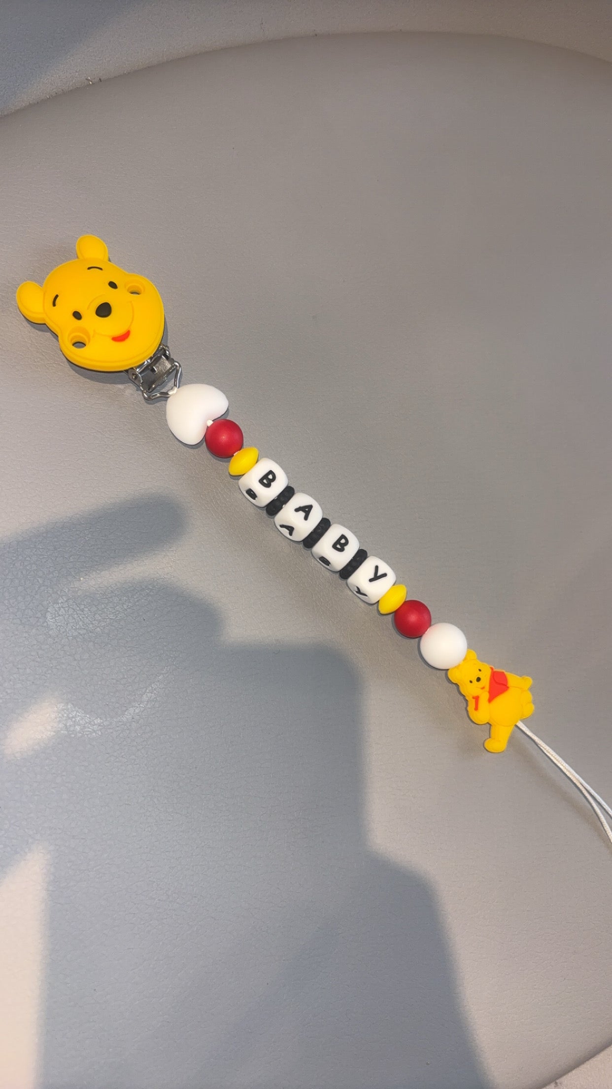 Attache tetine perles